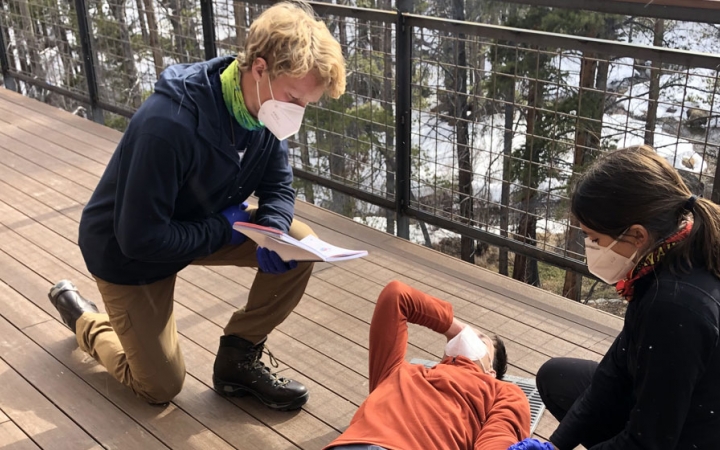 students participate in a wilderness first aid course on a gap year expedition with outward bound